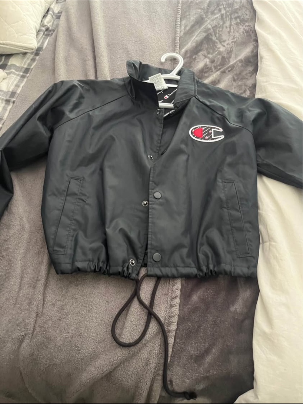 Champion Kids Black Puffer Coach Jacket with Red Logo Patch